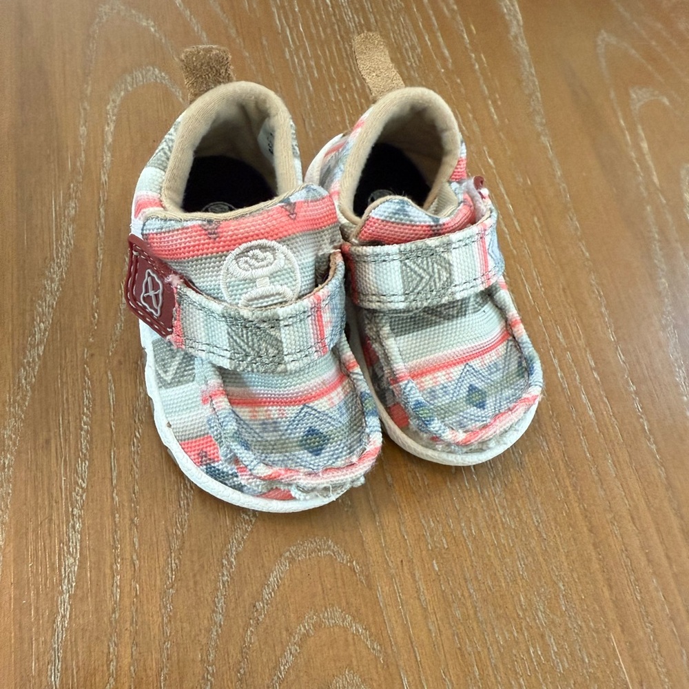 baby twisted X shoes